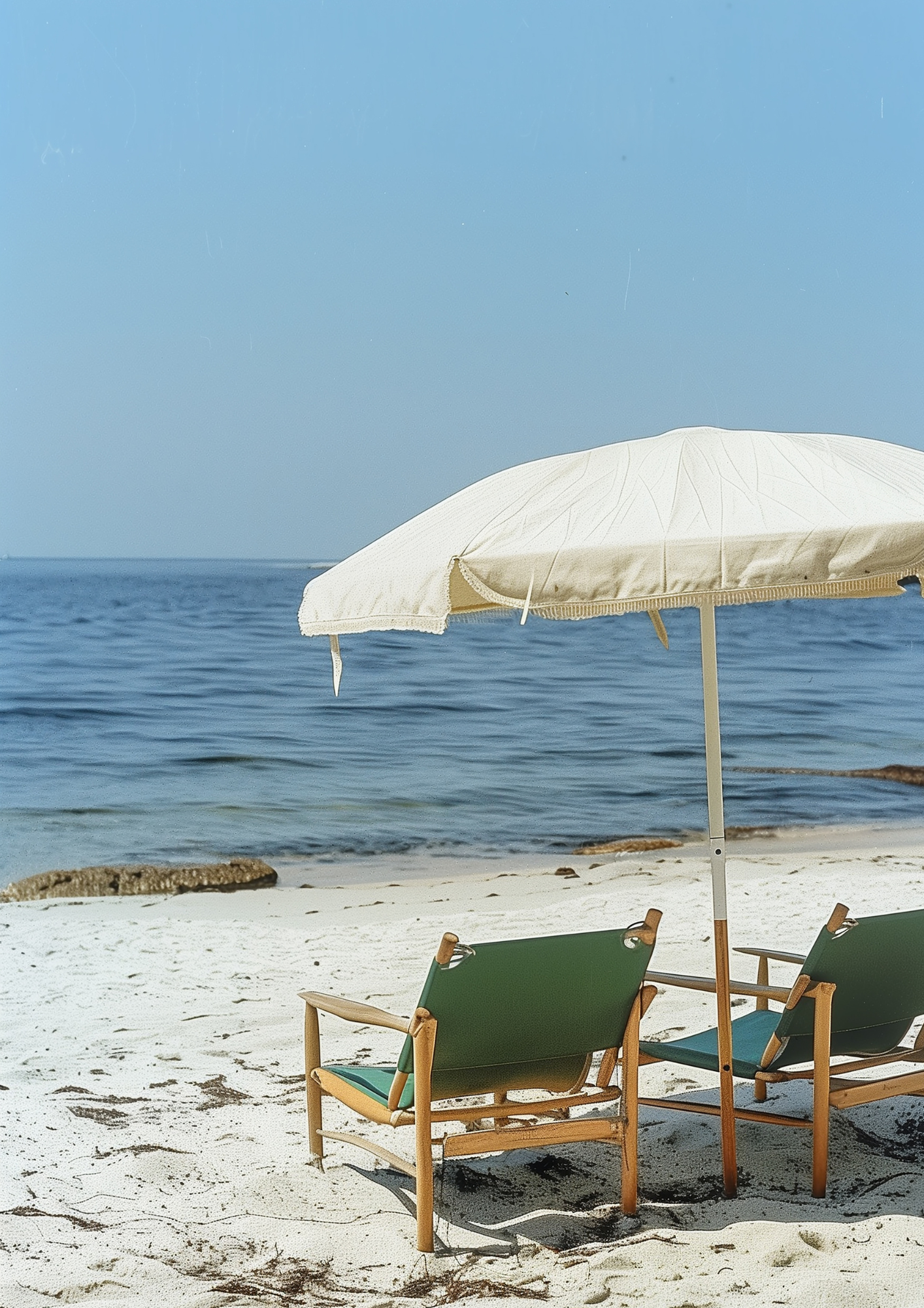 Strand mit Sonnenschirm, Spanisch lernen